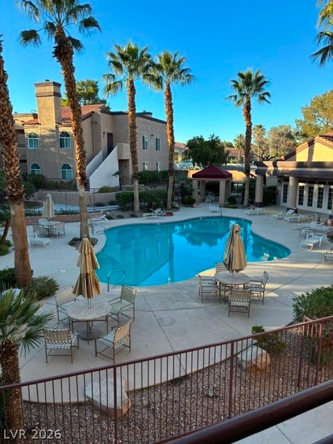 9325 West Desert Inn Road, Unit 244 Las Vegas, NV 89117 - Photo 40 of 55 An inviting resort-style pool with ample lounging areas awaits in this residential community.
