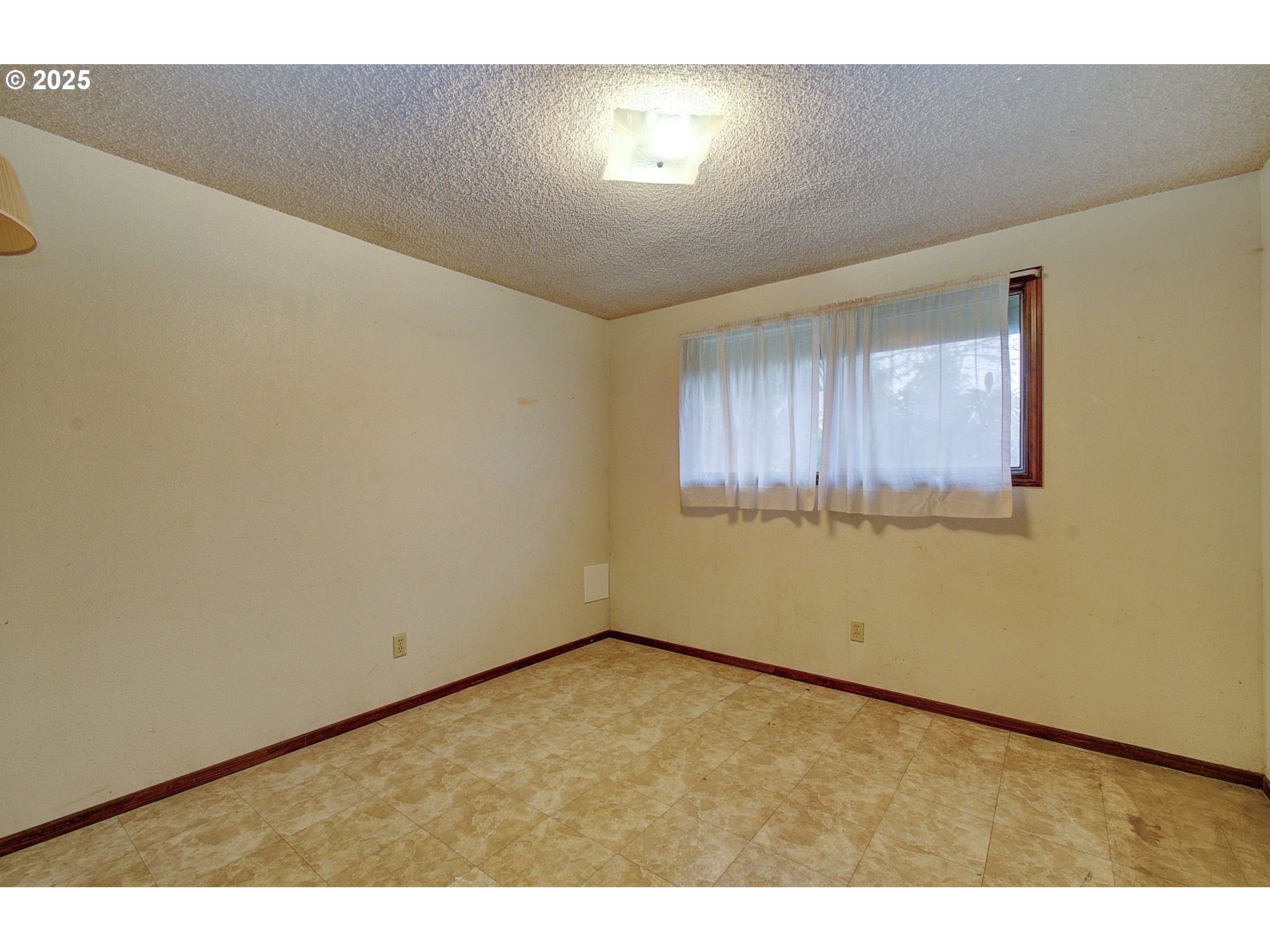 19409 Northeast Mattson Road Brush Prairie, WA 98606 - Photo 19 of 44 a view of an empty room with a window