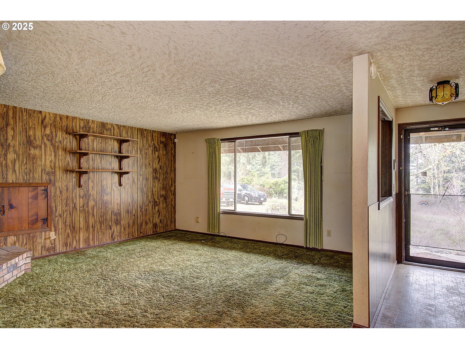 19409 Northeast Mattson Road Brush Prairie, WA 98606 - Photo 6 of 44 a view of an empty room with a window
