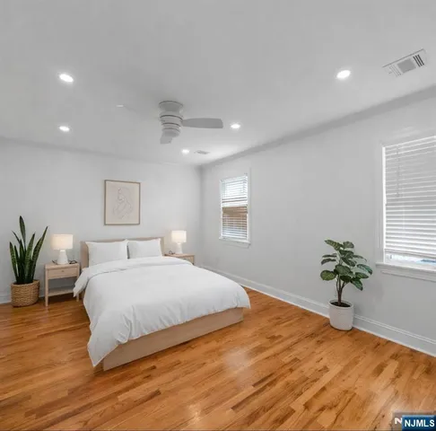a bathroom with a shower toilet and sink