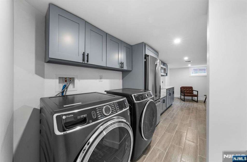 301 New Bridge Road Bergenfield, NJ 07621 - Photo 25 of 27 a utility room with dryer and washer