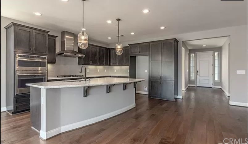 1555 Eucalyptus Road Nipomo, CA 93444 - Photo 3 of 5 a kitchen with stainless steel appliances granite countertop a refrigerator a sink and a stove