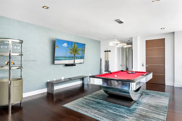 a living room with furniture and fireplace