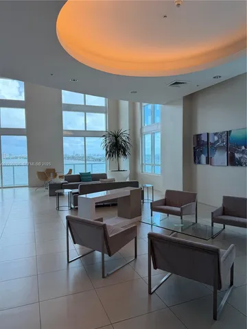 a kitchen with stainless steel appliances granite countertop a stove a sink a counter space and cabinets