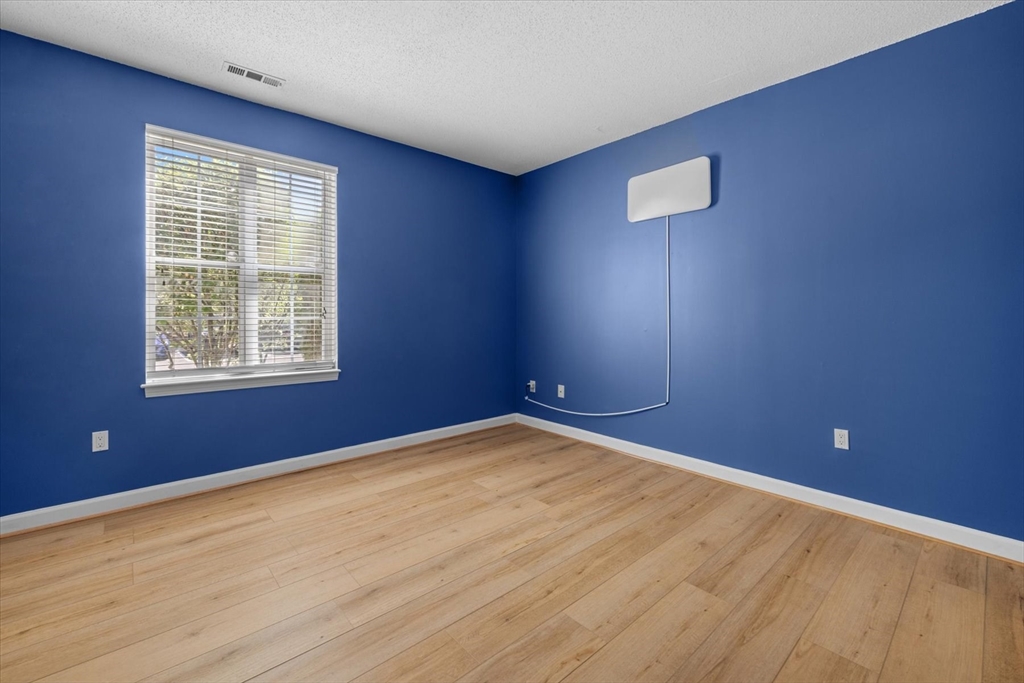 21 Hampshire Road, Unit 101 Methuen, MA 01844 - Photo 12 of 18 an empty room with windows