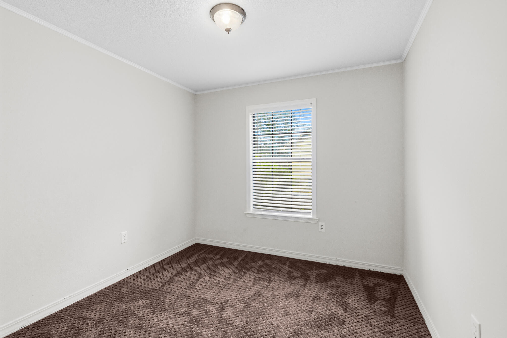 207 Pinoak Court Crestview, FL 32539 - Photo 19 of 33 an empty room with a window