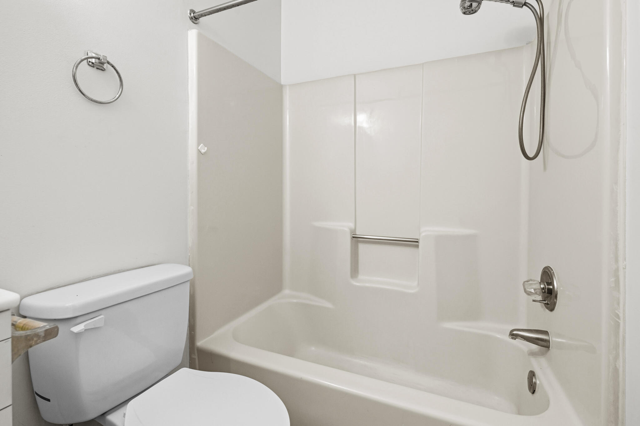 207 Pinoak Court Crestview, FL 32539 - Photo 21 of 33 a white toilet sitting next to a bath tub