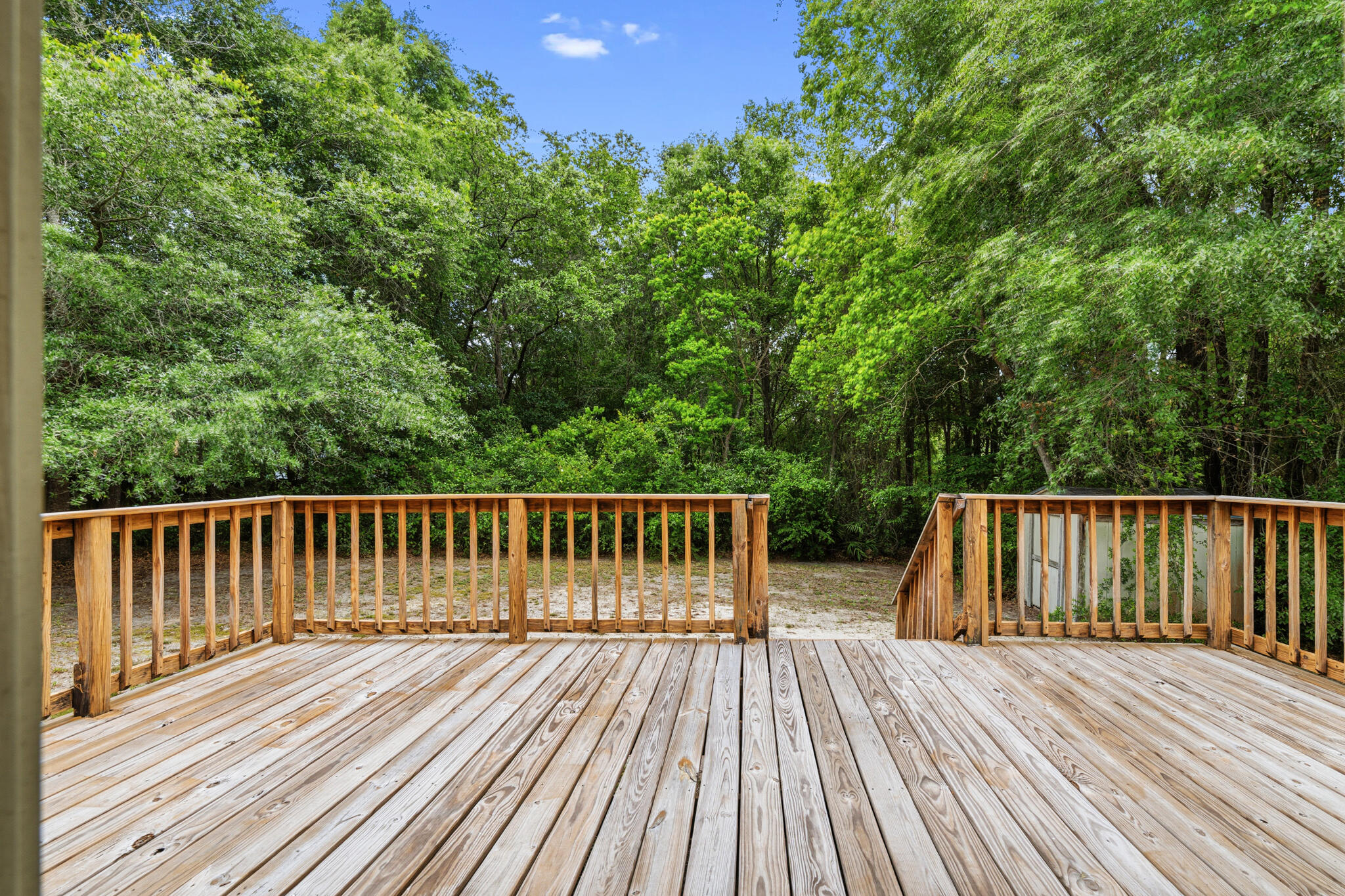 207 Pinoak Court Crestview, FL 32539 - Photo 24 of 33 a view of balcony with wooden floor