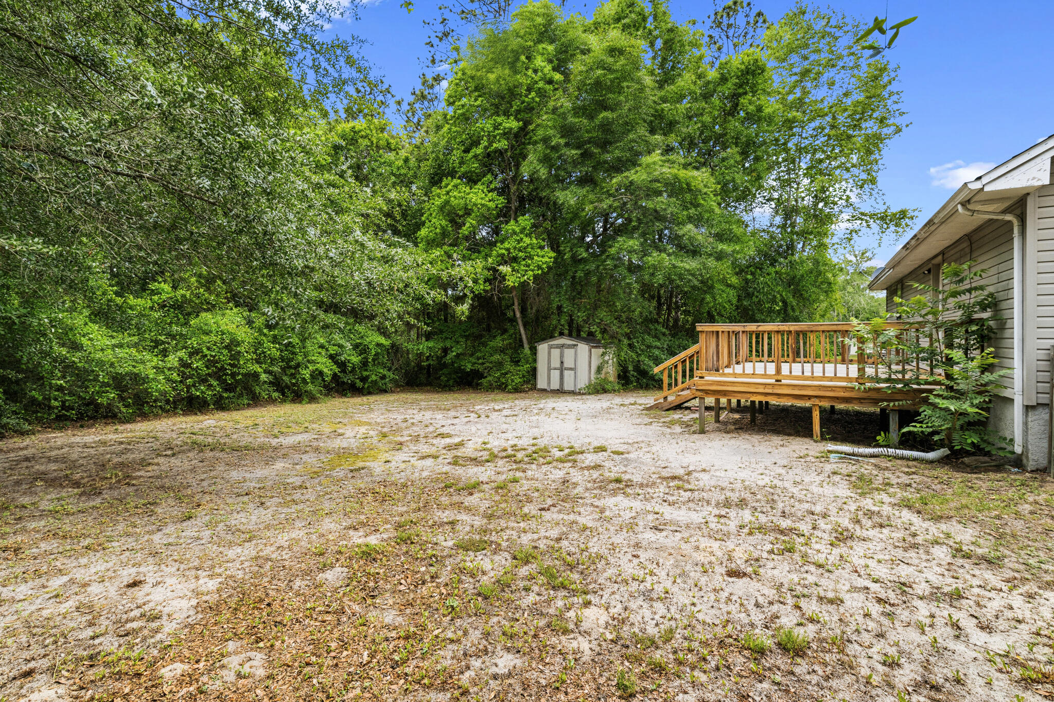 207 Pinoak Court Crestview, FL 32539 - Photo 26 of 33 a house with trees in the background