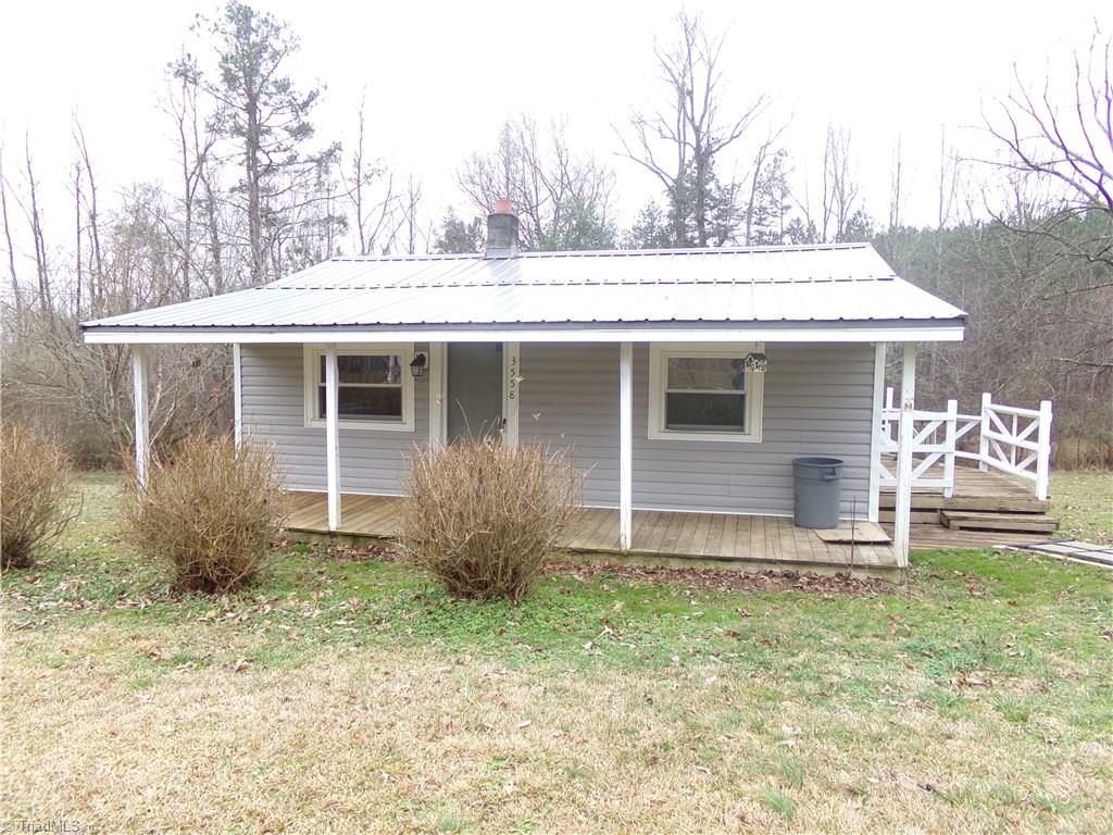 3558 Trinity Church Road Seagrove, NC 27341 - Photo 1 of 22 Bring the Rocking Chairs and sit a spell.