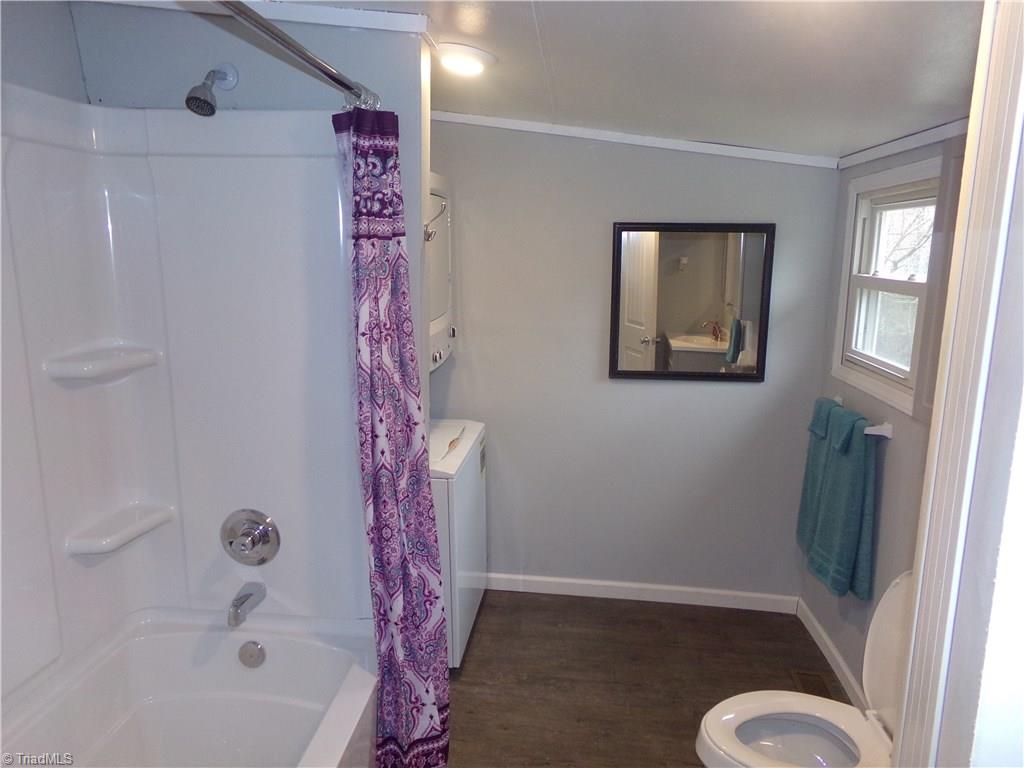 3558 Trinity Church Road Seagrove, NC 27341 - Photo 13 of 22 New tub/shower combo. New toilet. New vanity. New Washer & Dryer. New flooring.