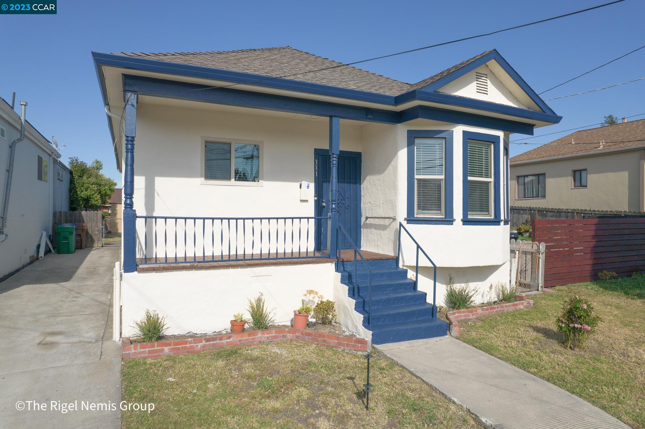 311 Garretson Avenue Rodeo, CA 94572 - Photo 1 of 1 a view of a house with wooden fence