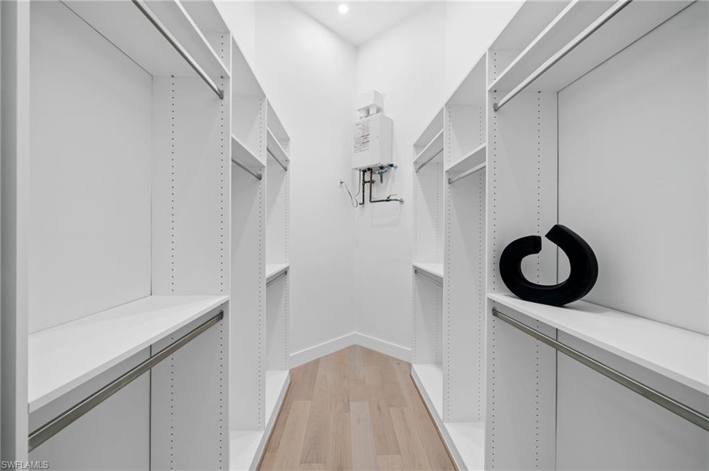 7834 Classics Drive Naples, FL 34113 - Photo 30 of 50 a bathroom with a sink and a shower