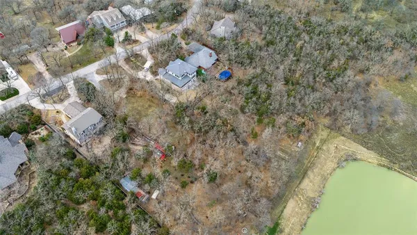 an aerial view of residential house with outdoor space