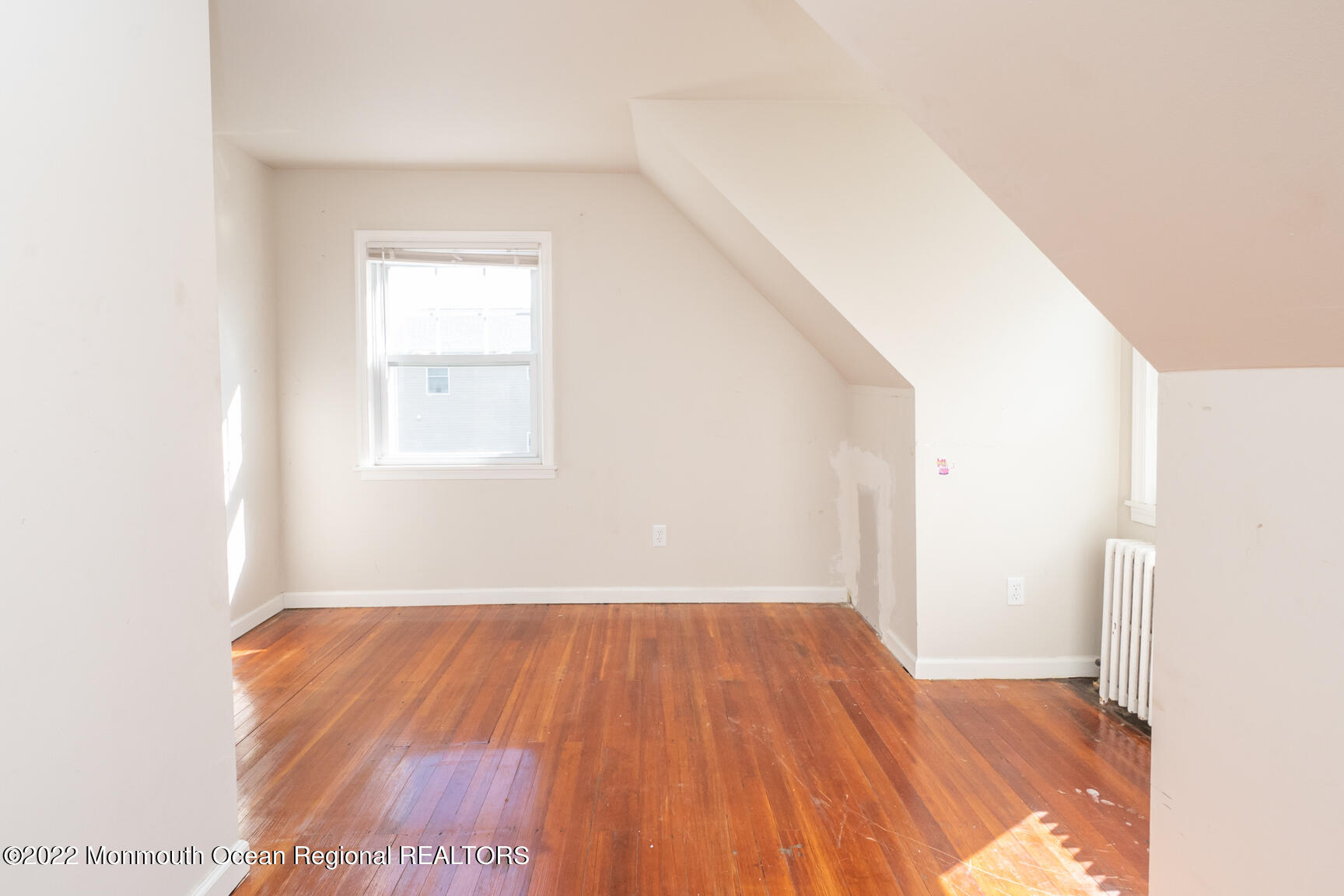 965 Leonardville Road Atlantic Highlands, NJ 07716 - Photo 19 of 29 a view of a room with wooden floor and a window