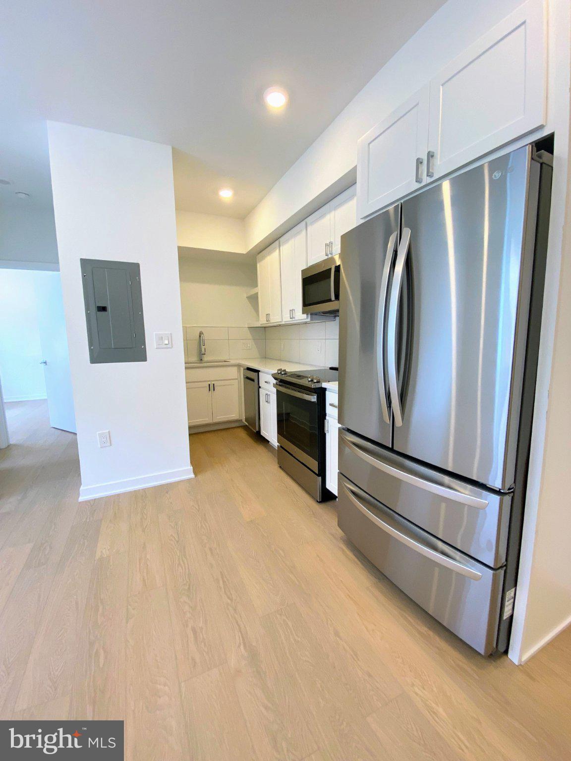 3435 Brown Street Northwest, Unit 1 Washington, DC 20010 - Photo 3 of 15 Modern kitchen with sleek appliances.