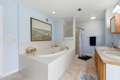 a bathroom with a sink and a bathtub