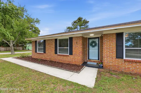 front view of house with a yard