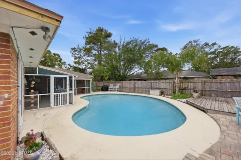 a view of a house with a swimming pool