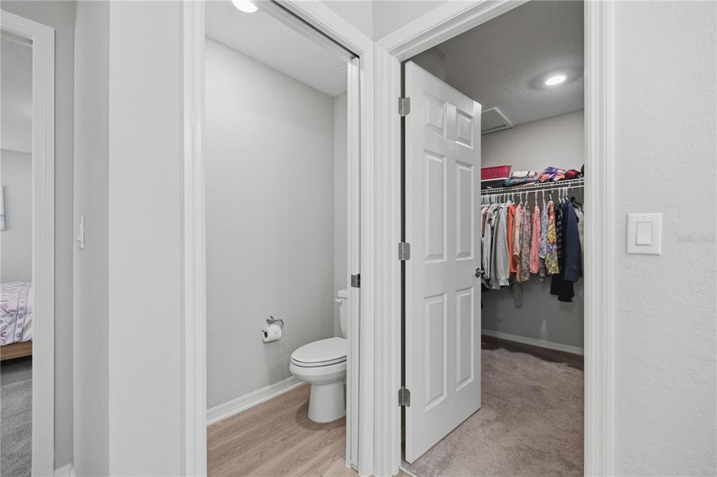 4611 Southeast 89th Street Ocala, FL 34480 - Photo 17 of 33 a bathroom with a toilet and a shower