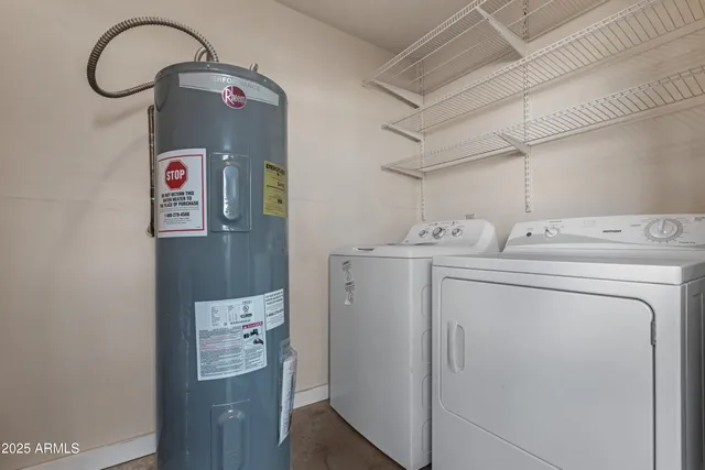 a bathroom with a mirror and a shower