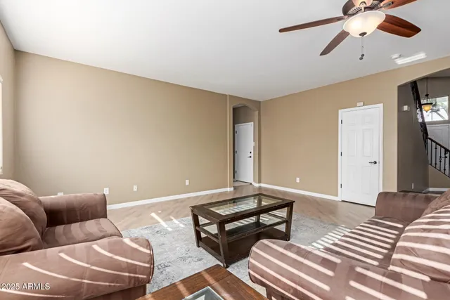 a kitchen with kitchen island a sink stainless steel appliances and cabinets