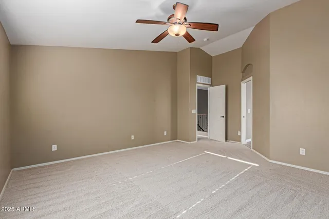 a white bath tub sitting in a bathroom next to a window