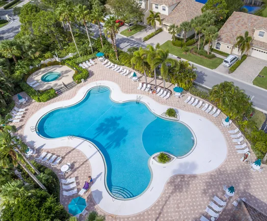 a view of swimming pool with a garden