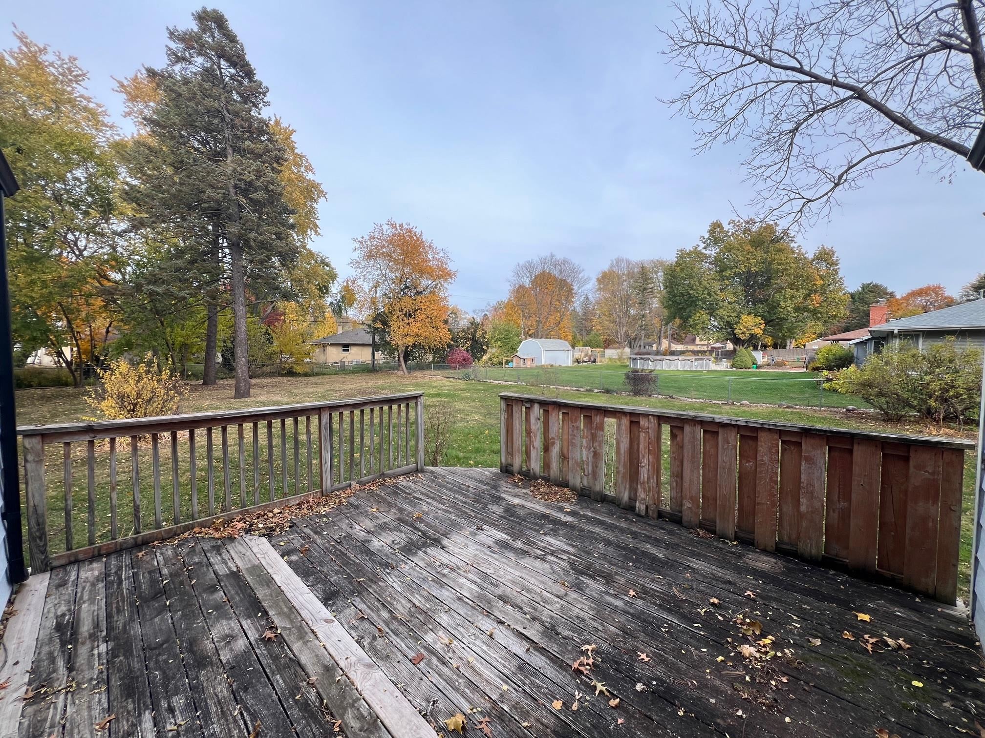 3906 Abbotsford Road Rockford, IL 61107 - Photo 13 of 16 a view of a wooden deck