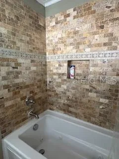 a bathroom with a bathtub