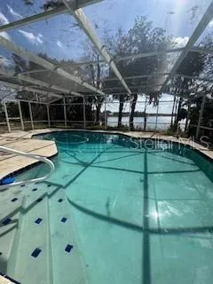 a view of a swimming pool with an outdoor space