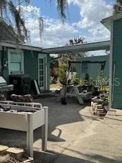 a view of swimming pool with a yard