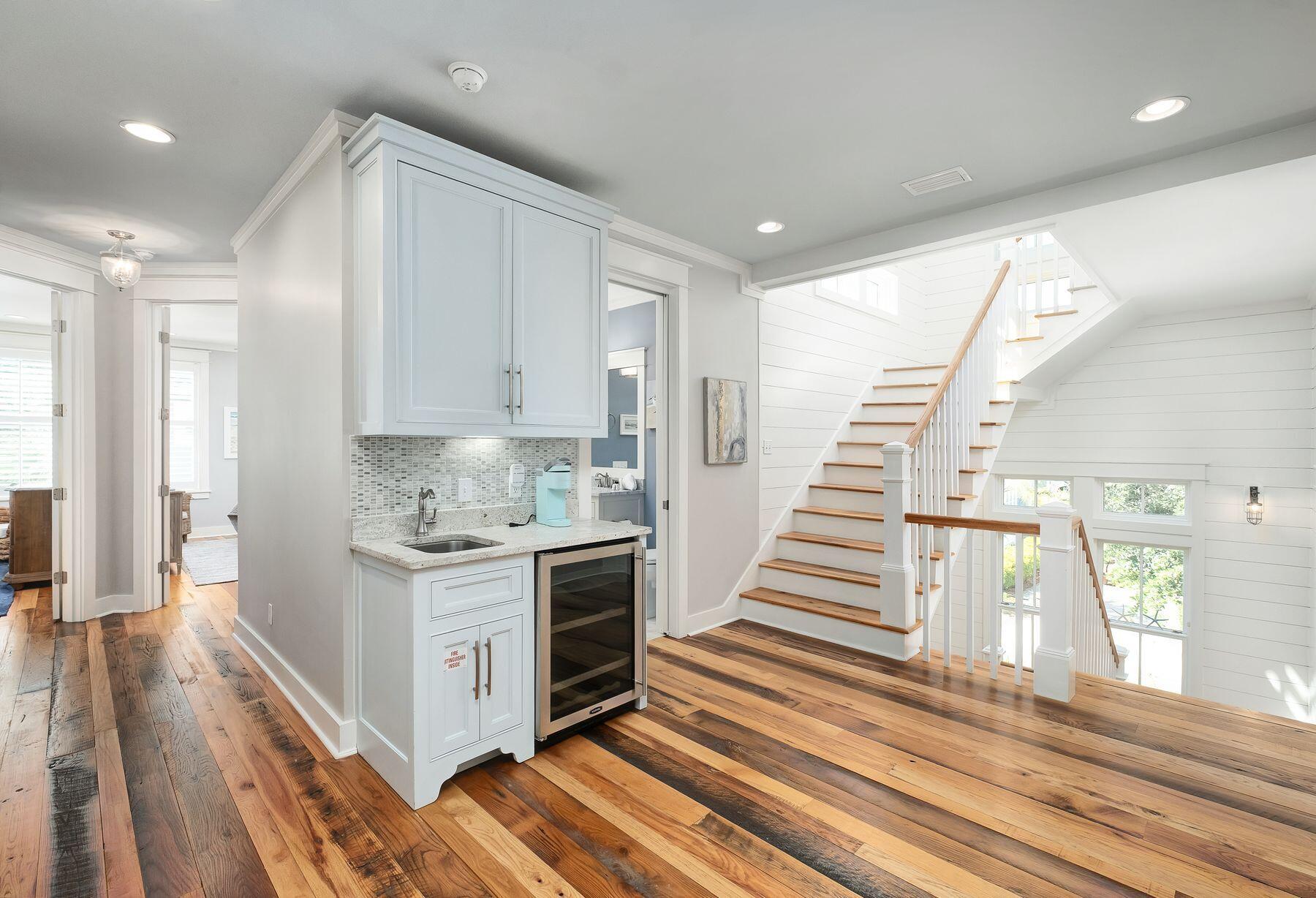 13 Madaket Way Watersound, FL 32461 - Photo 20 of 51 a kitchen with cabinets and wooden floor