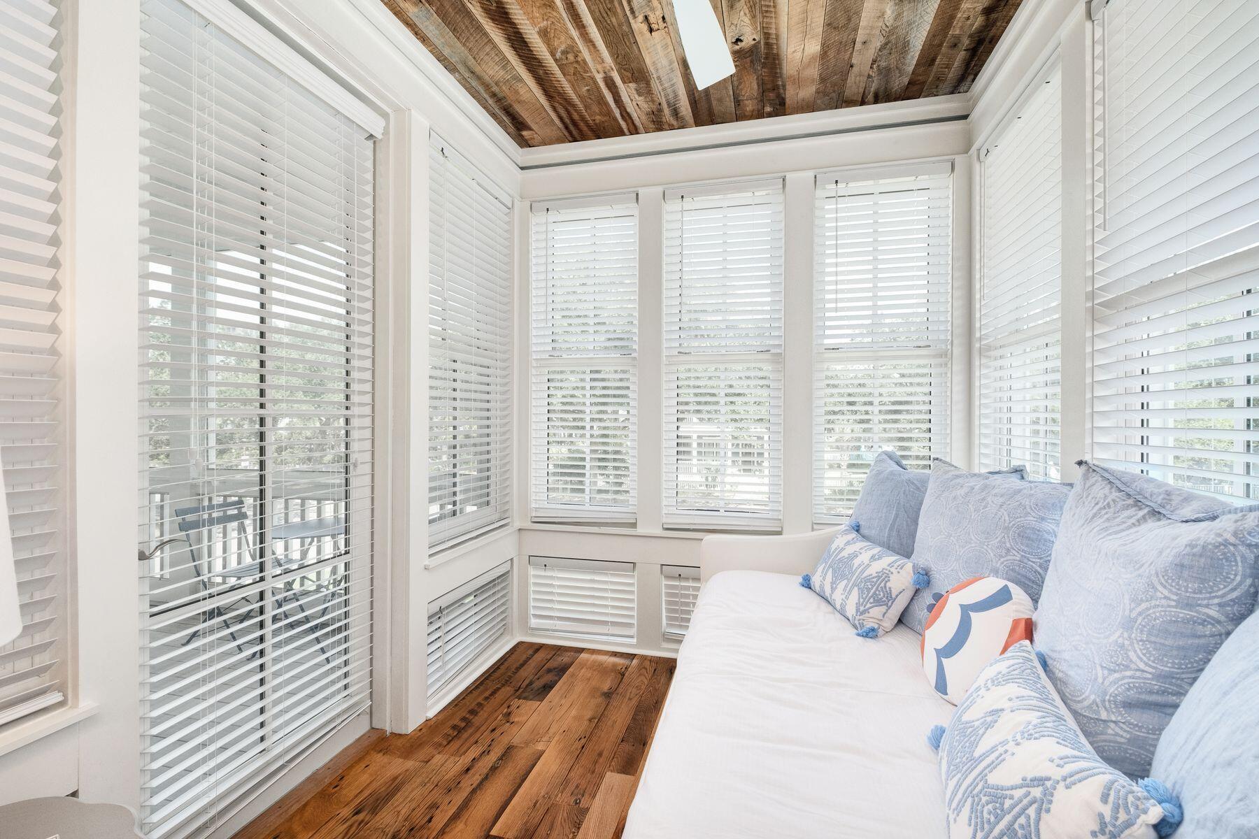 13 Madaket Way Watersound, FL 32461 - Photo 29 of 51 a living room with furniture and a large window with wooden floor