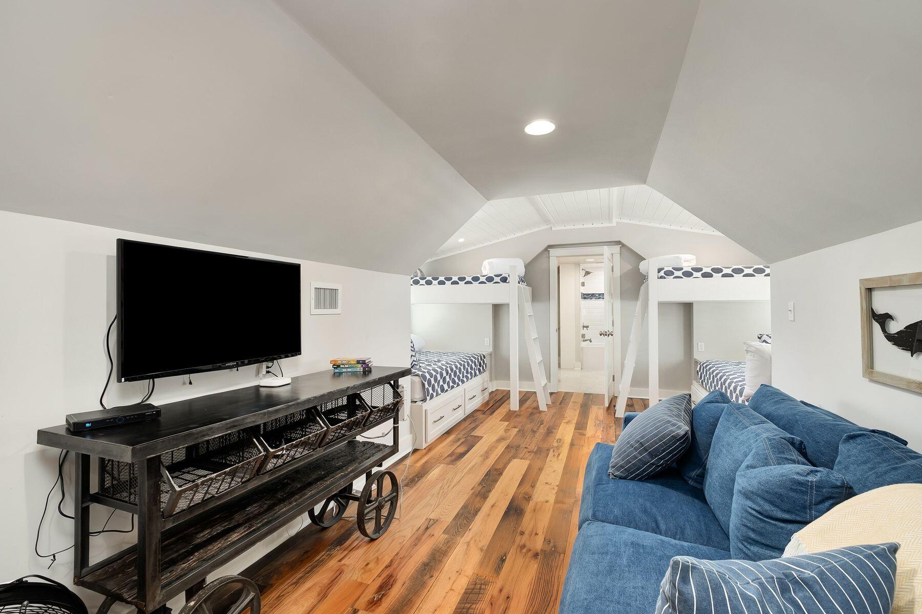 13 Madaket Way Watersound, FL 32461 - Photo 30 of 51 a living room with furniture and a flat screen tv