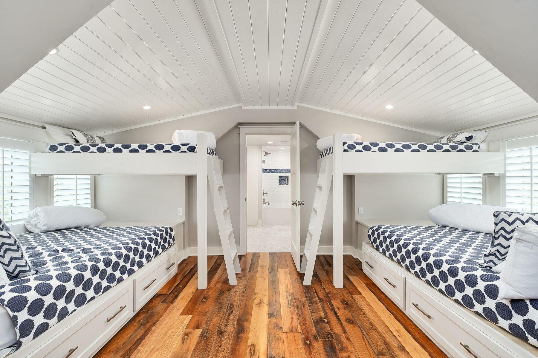 13 Madaket Way Watersound, FL 32461 - Photo 31 of 51 a bedroom with a bed and walk in closet