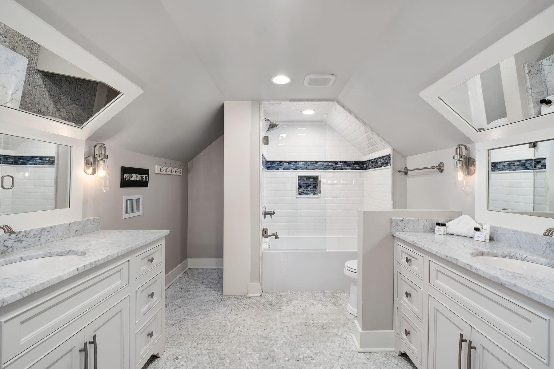 13 Madaket Way Watersound, FL 32461 - Photo 32 of 51 a spacious bathroom with a granite countertop sink mirror and a bathtub