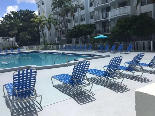 a view of balcony with furniture and outdoor seating