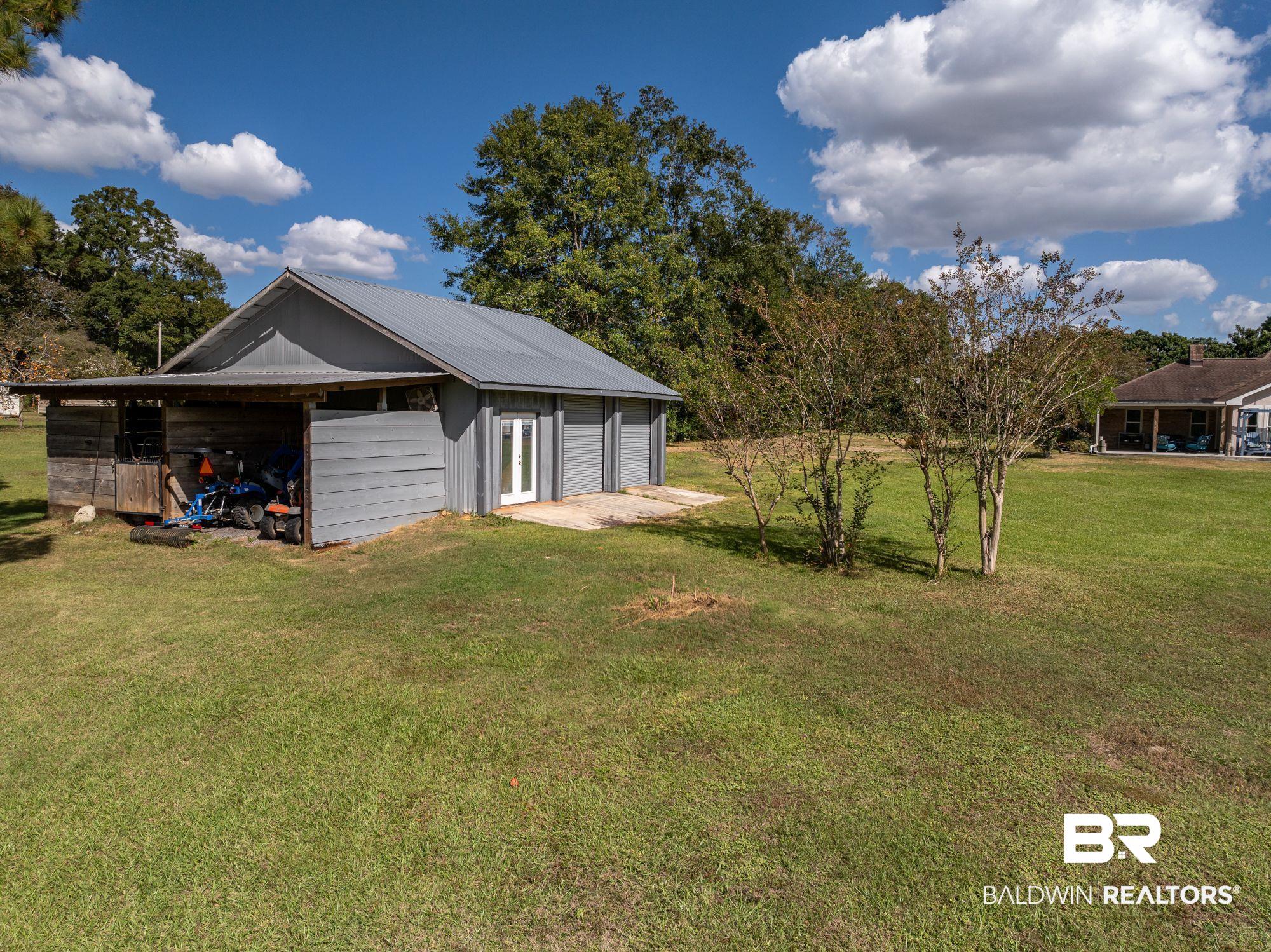 20037 County Road 33 Fairhope, AL 36532 - Photo 77 of 79 View of yard featuring an outdoor structure