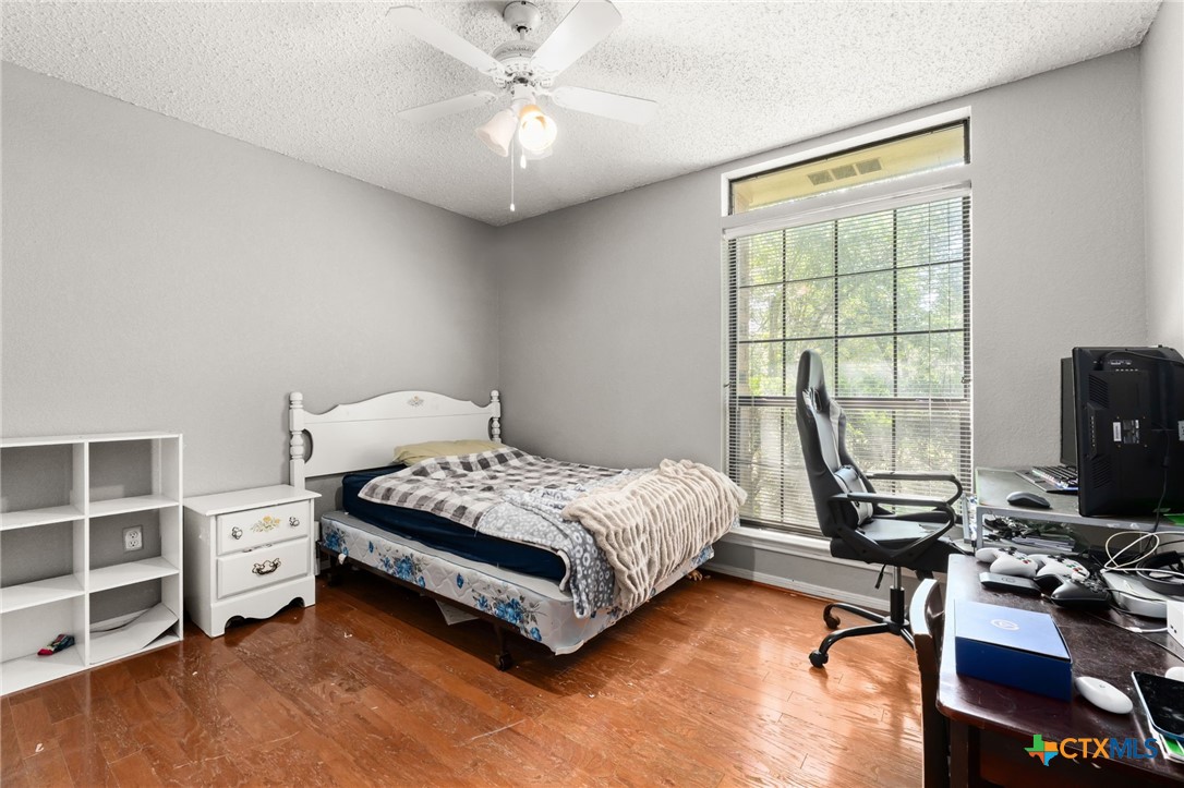 2187 Stagecoach Road Killeen, TX 76542 - Photo 17 of 27 a bedroom with a bed and a window