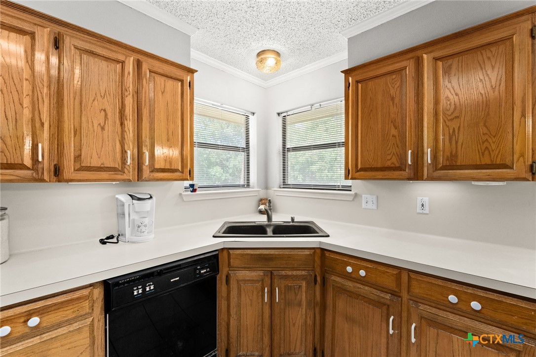 2187 Stagecoach Road Killeen, TX 76542 - Photo 9 of 27 a kitchen with a sink and a window