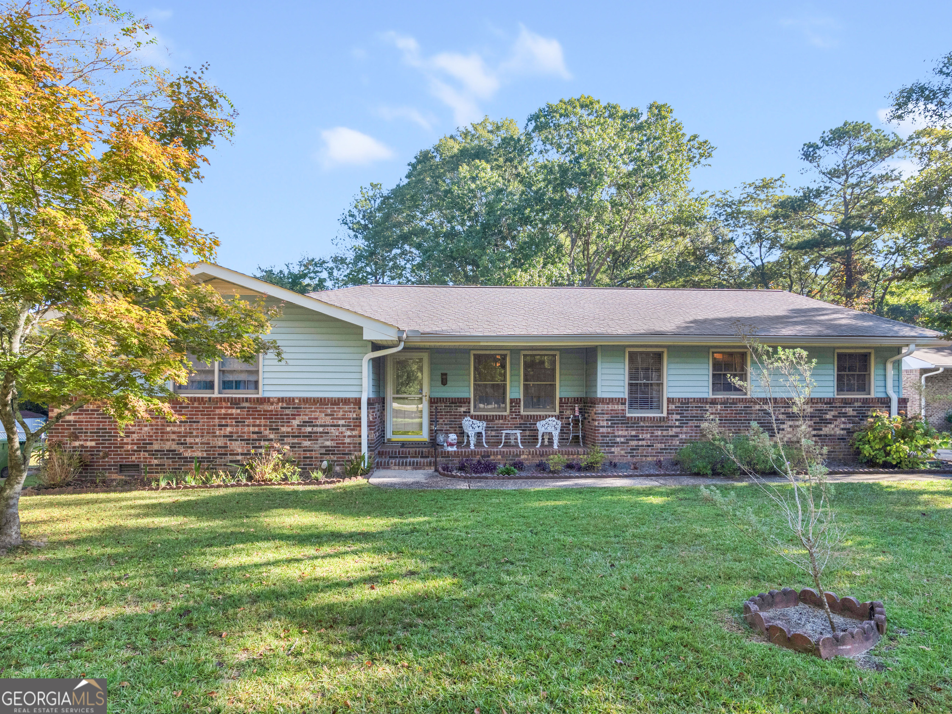 413 Maddox Road Griffin, GA 30224 - Photo 1 of 1 a view of a house with a yard and sitting area