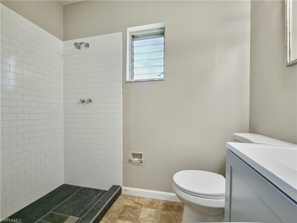 3488 Roberts Street Mims, FL 32754 - Photo 8 of 15 a bathroom with a toilet