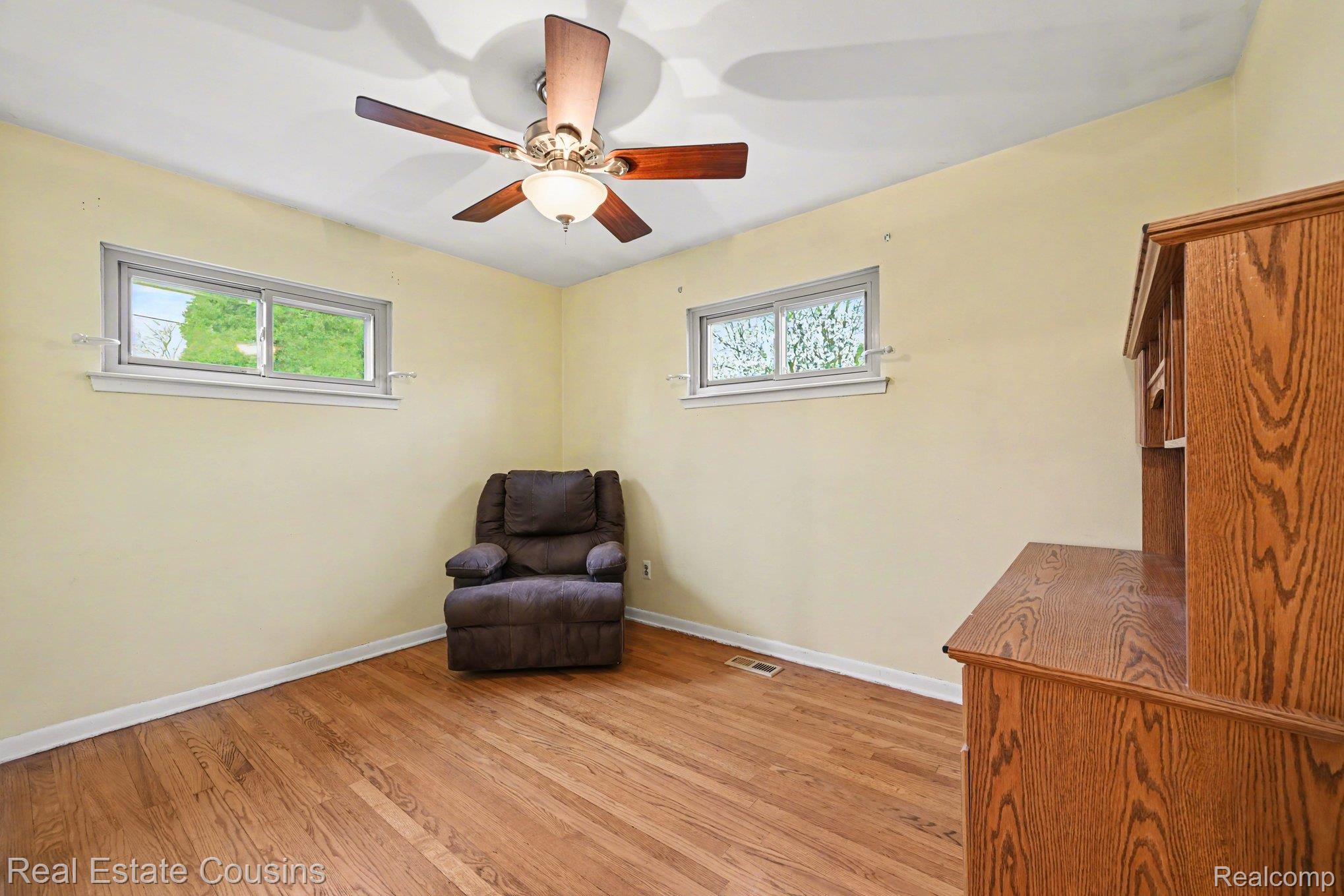 32224 Joy Road Livonia, MI 48150 - Photo 11 of 33 Sitting room featuring light wood-style floors and a ceiling fan