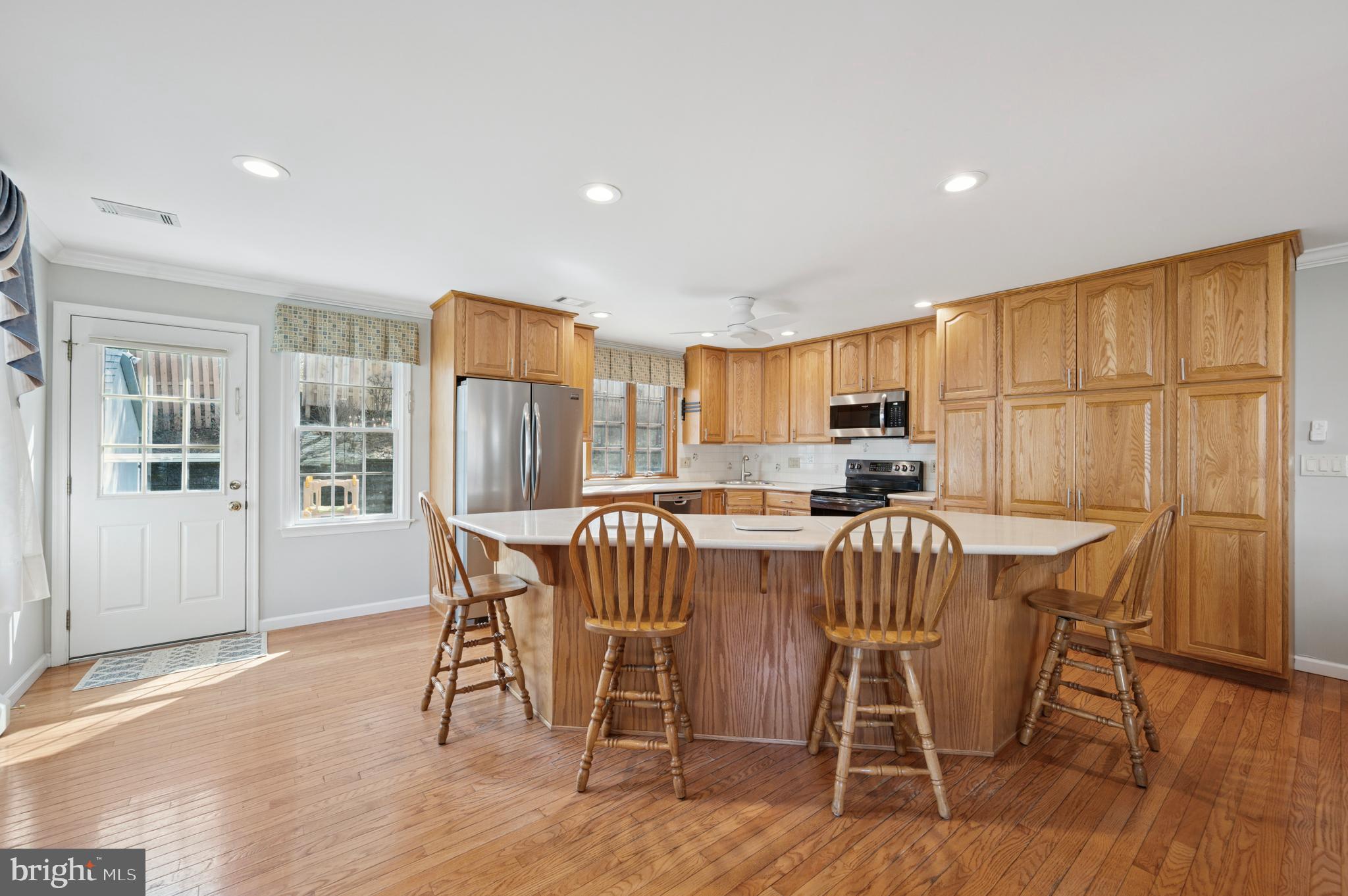 946 Georgetown Road Swarthmore, PA 19081 - Photo 12 of 36 a view of a dining room with furniture window and wooden floor