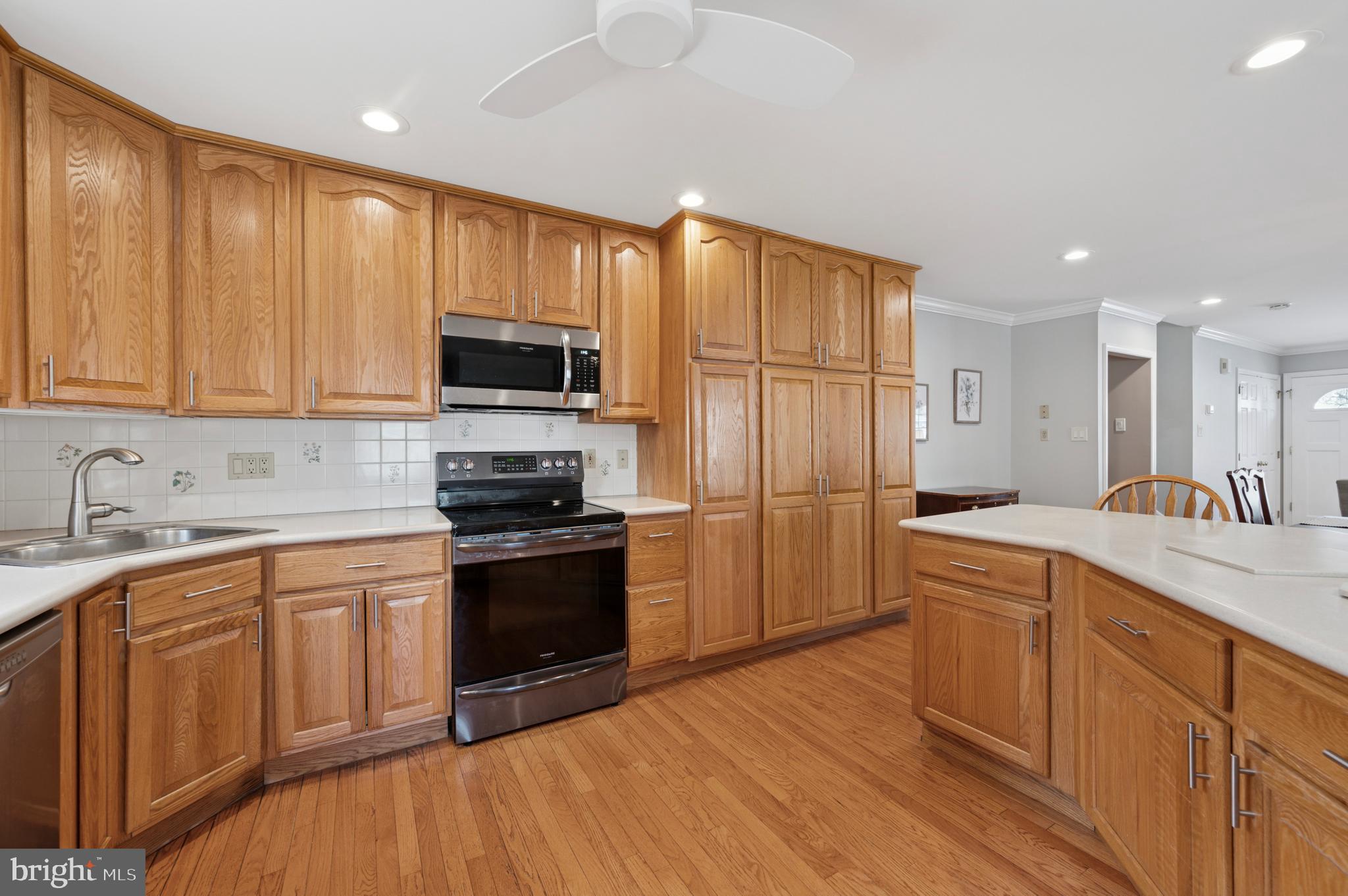 946 Georgetown Road Swarthmore, PA 19081 - Photo 17 of 36 a kitchen with a sink stove and refrigerator