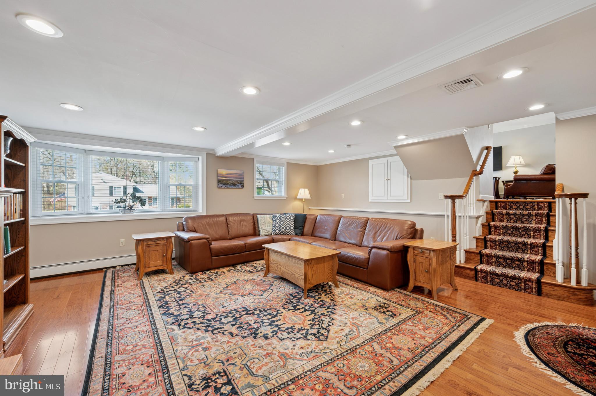 946 Georgetown Road Swarthmore, PA 19081 - Photo 18 of 36 a living room with furniture and wooden floor