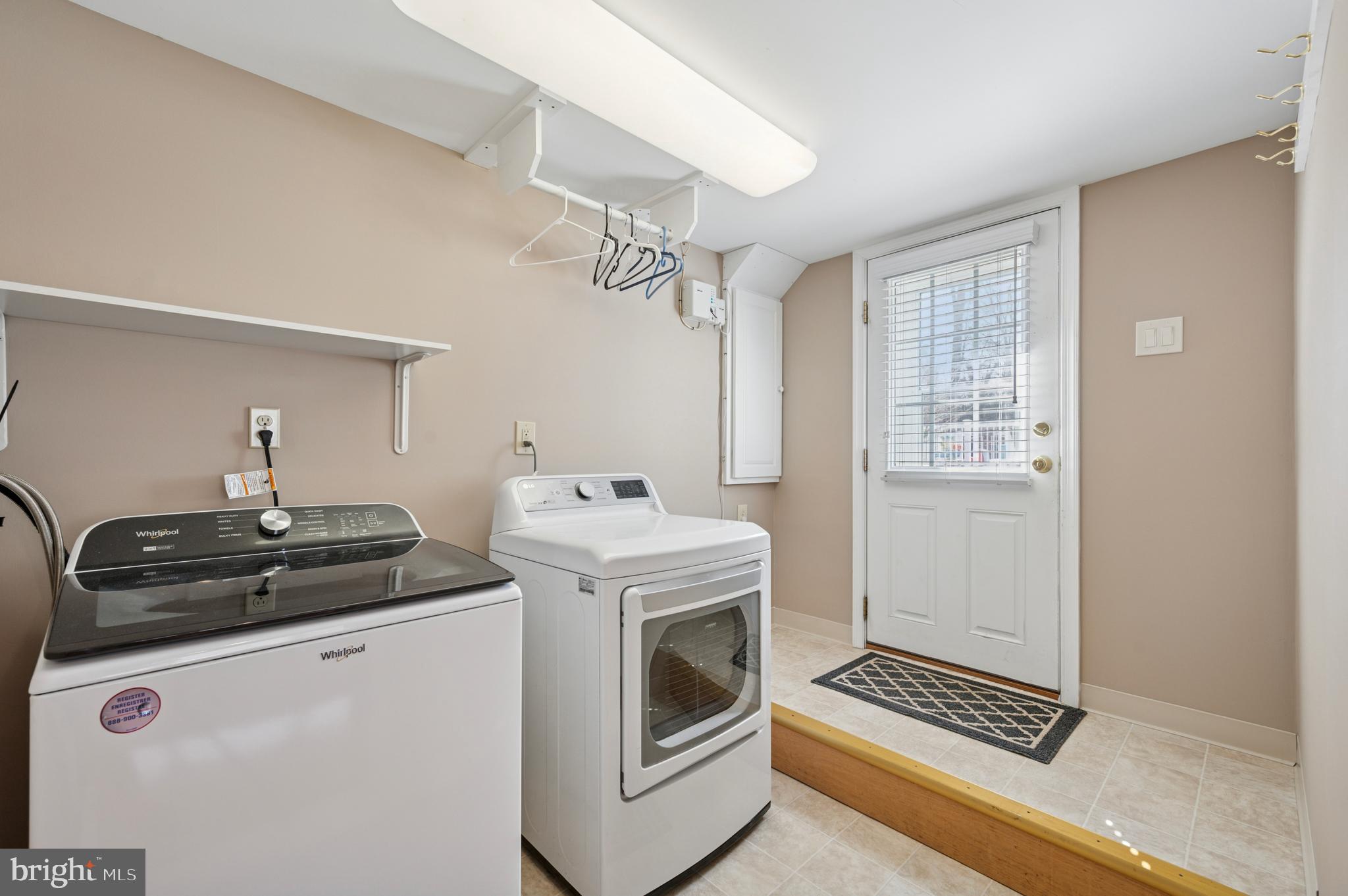 946 Georgetown Road Swarthmore, PA 19081 - Photo 21 of 36 a utility room with closet dryer and washer