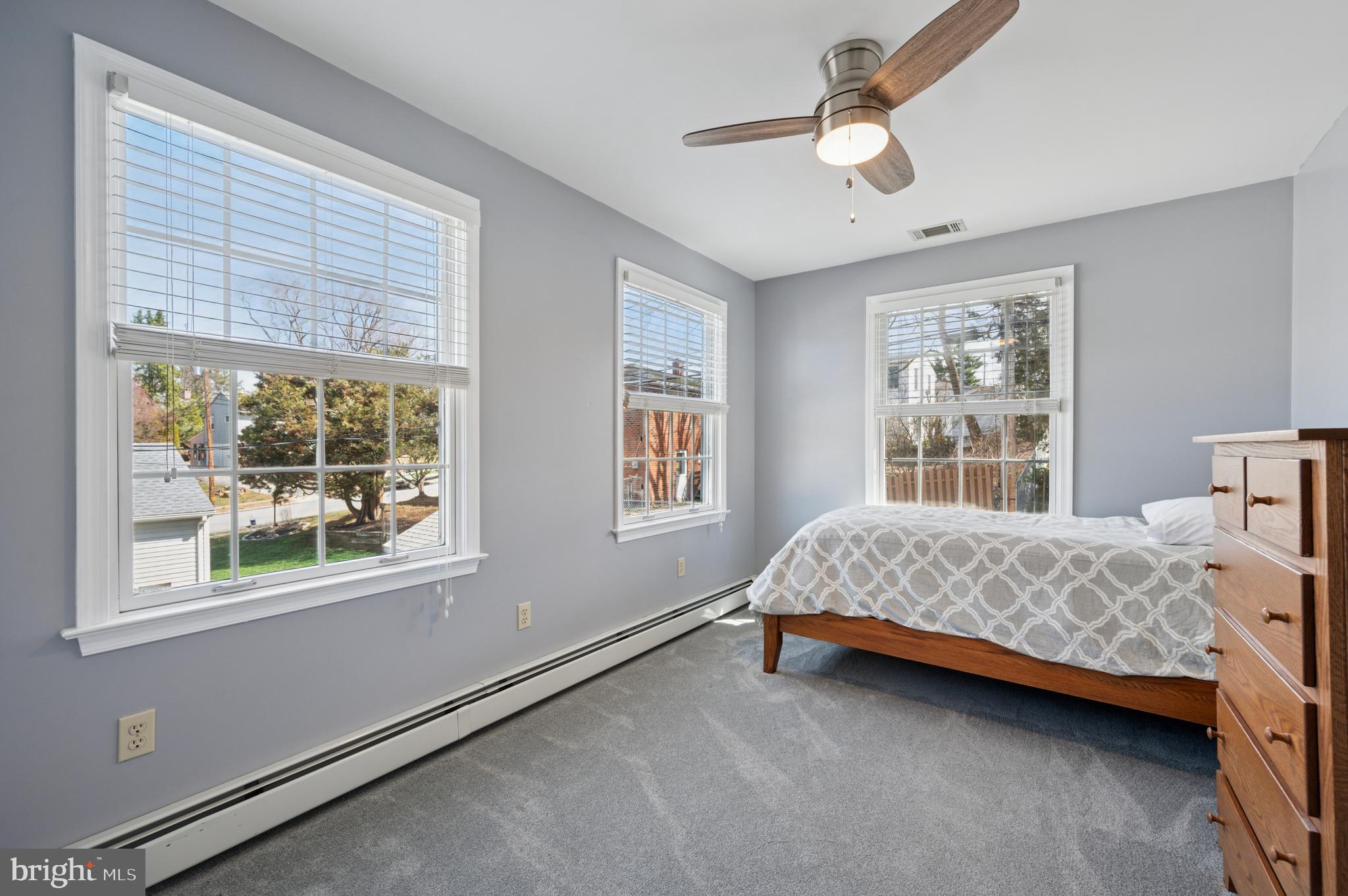 946 Georgetown Road Swarthmore, PA 19081 - Photo 25 of 36 a bedroom with a bed and a window
