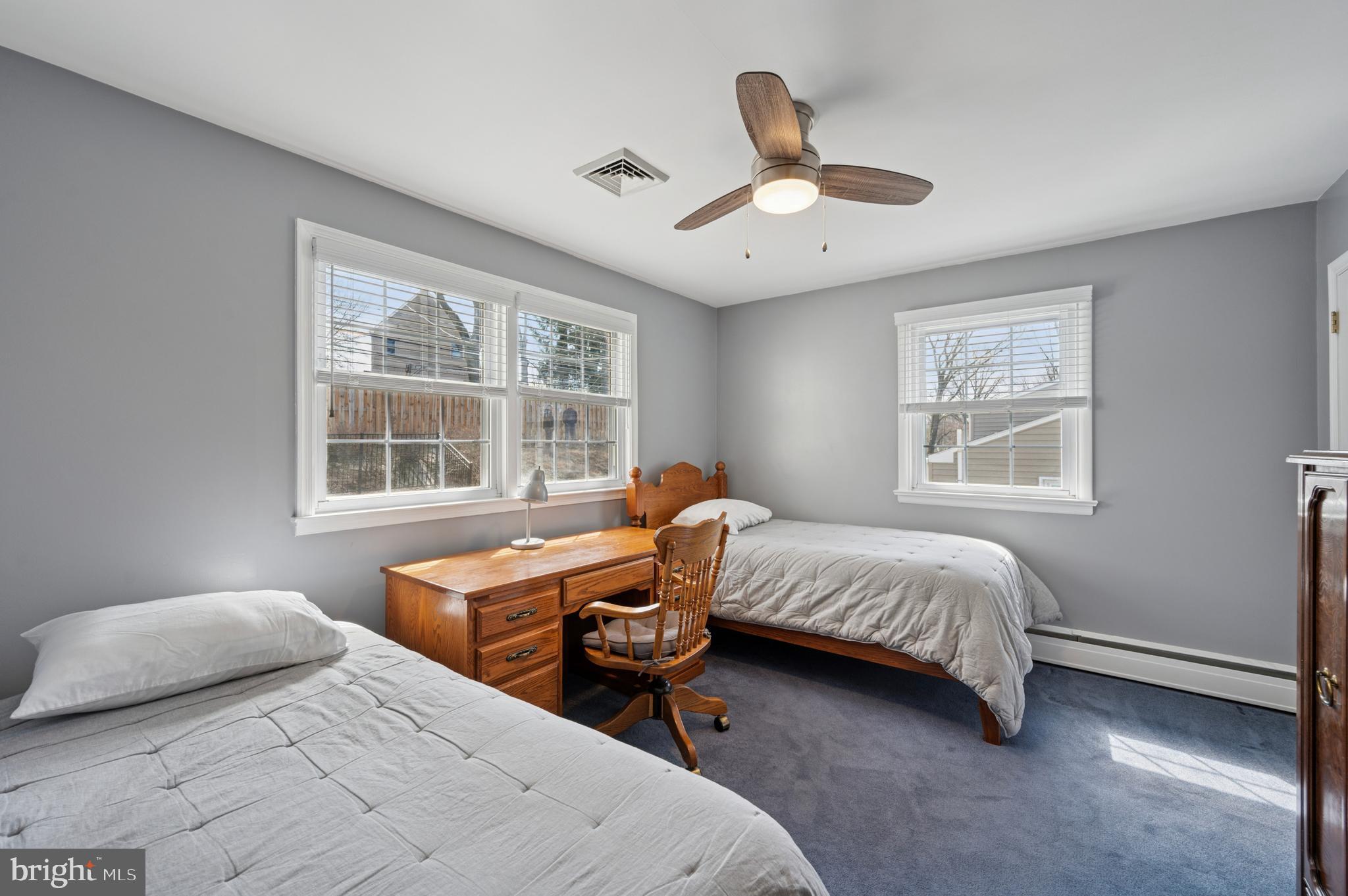 946 Georgetown Road Swarthmore, PA 19081 - Photo 28 of 36 a bedroom with a bed and a window